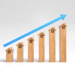 The graph of the house is rising and has a blue arrow, Real esta