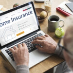 home-insurance-concept-laptop